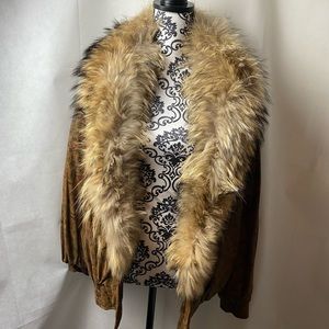 Fur trimmed bomber jacket.